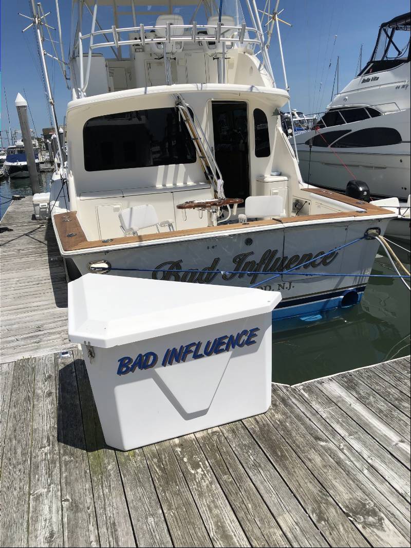 Dock box at marina  Lettering from Marino  C, NJ